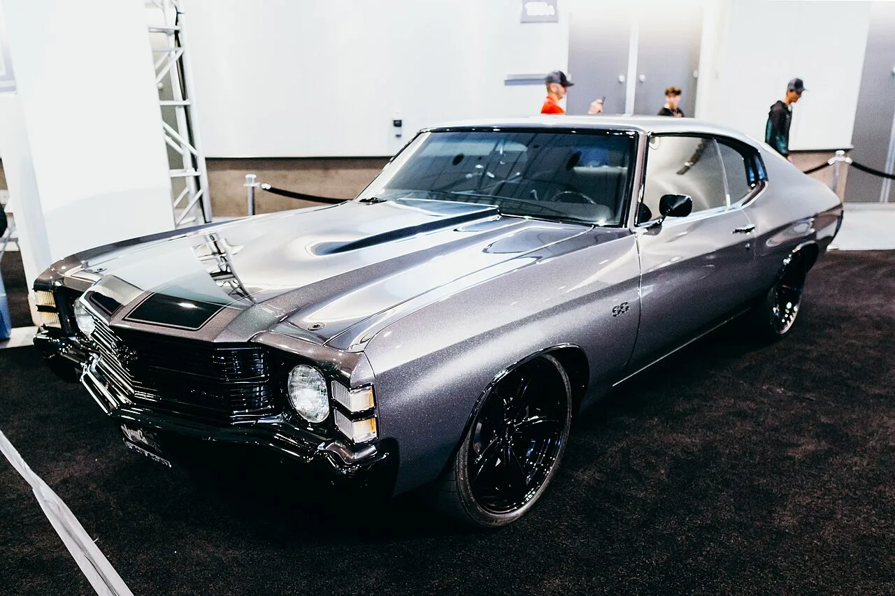 Silver custom Chevrolet Chevelle coupe with black wheels and extensive body changes at the 2022 Los Angeles Auto Show.